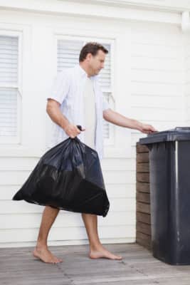 Man taking out garbage