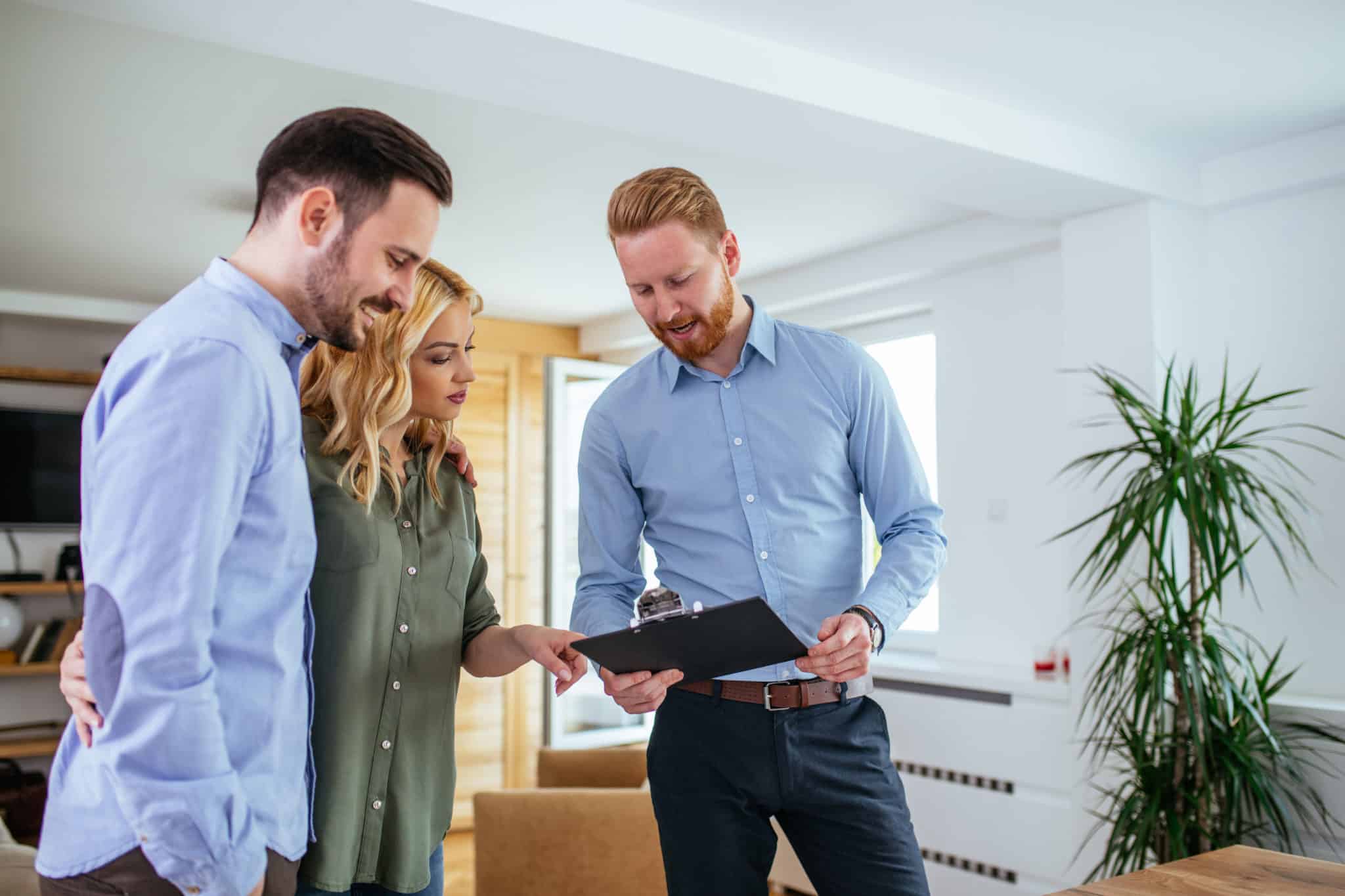 A property manager confers with tenants.